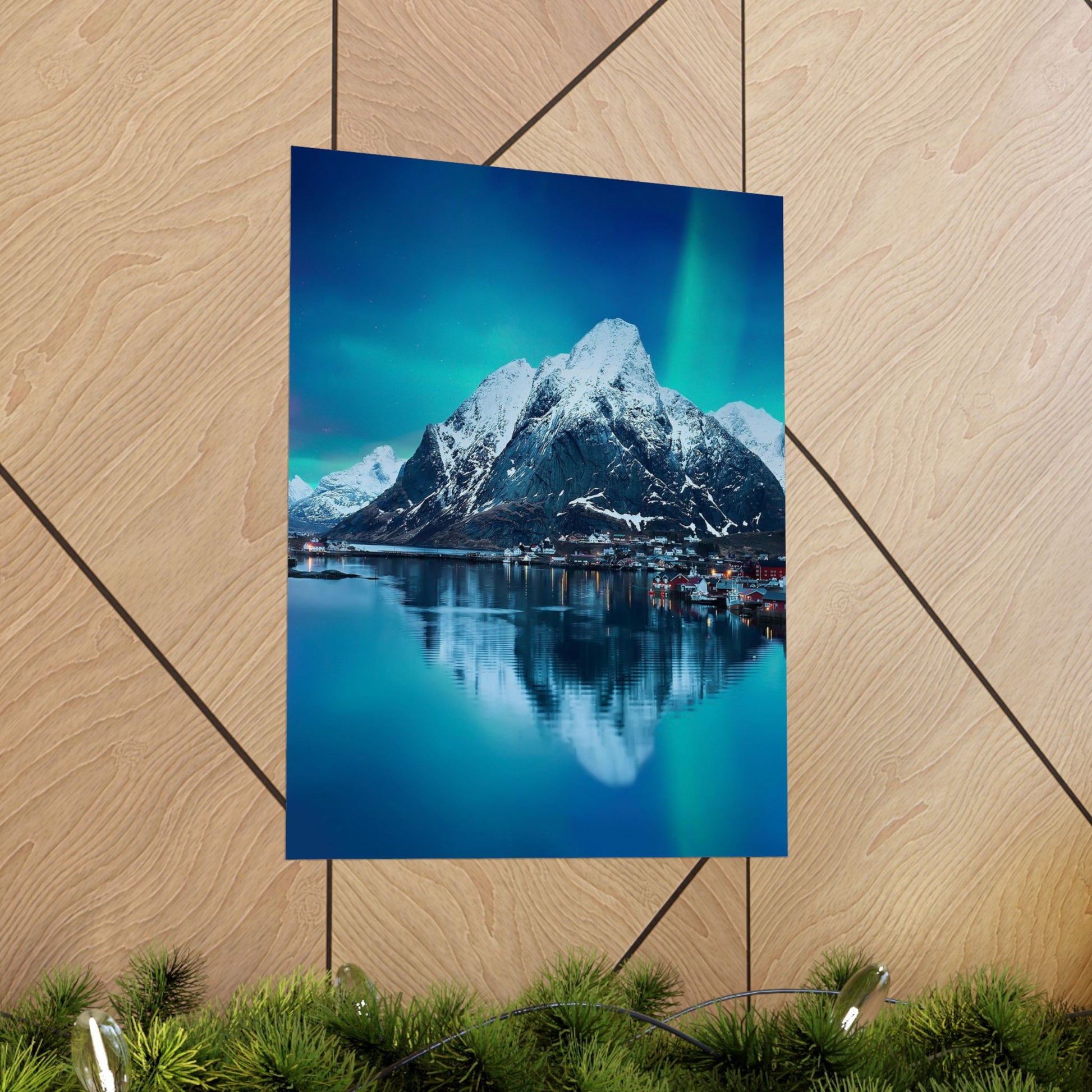 Poster of a mountain landscape with a lake on a wooden surface