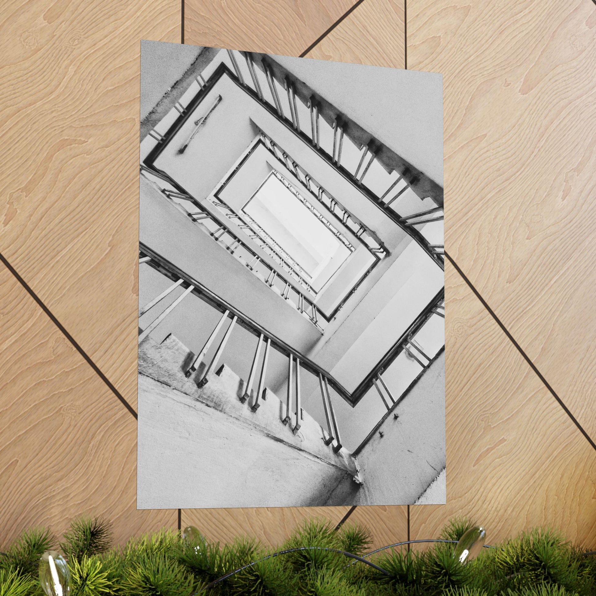 Black and white photo of a staircase on a wooden floor