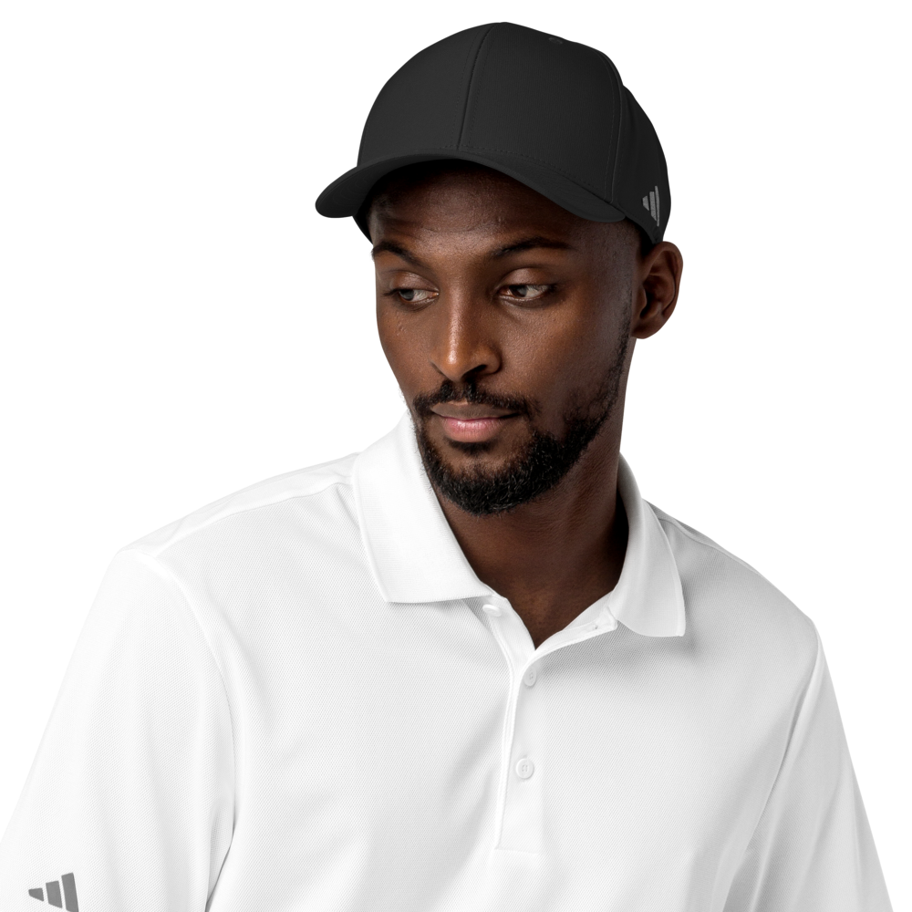 Man wearing a black Adidas cap and white shirt on a white background