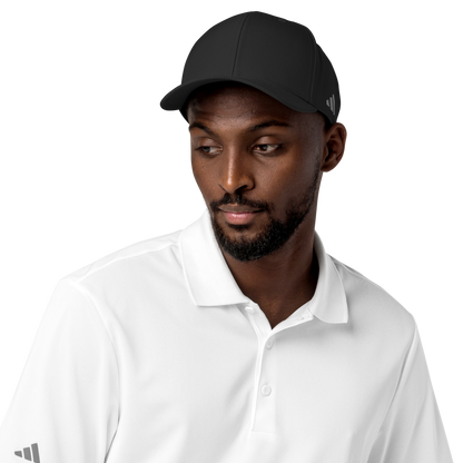 Man wearing a black Adidas cap and white shirt on a white background