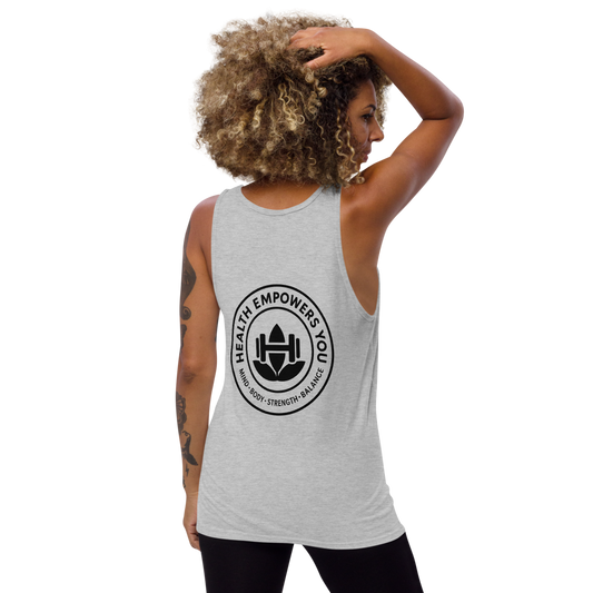 Woman wearing a gray tank top with a logo and text on the back, on a white background