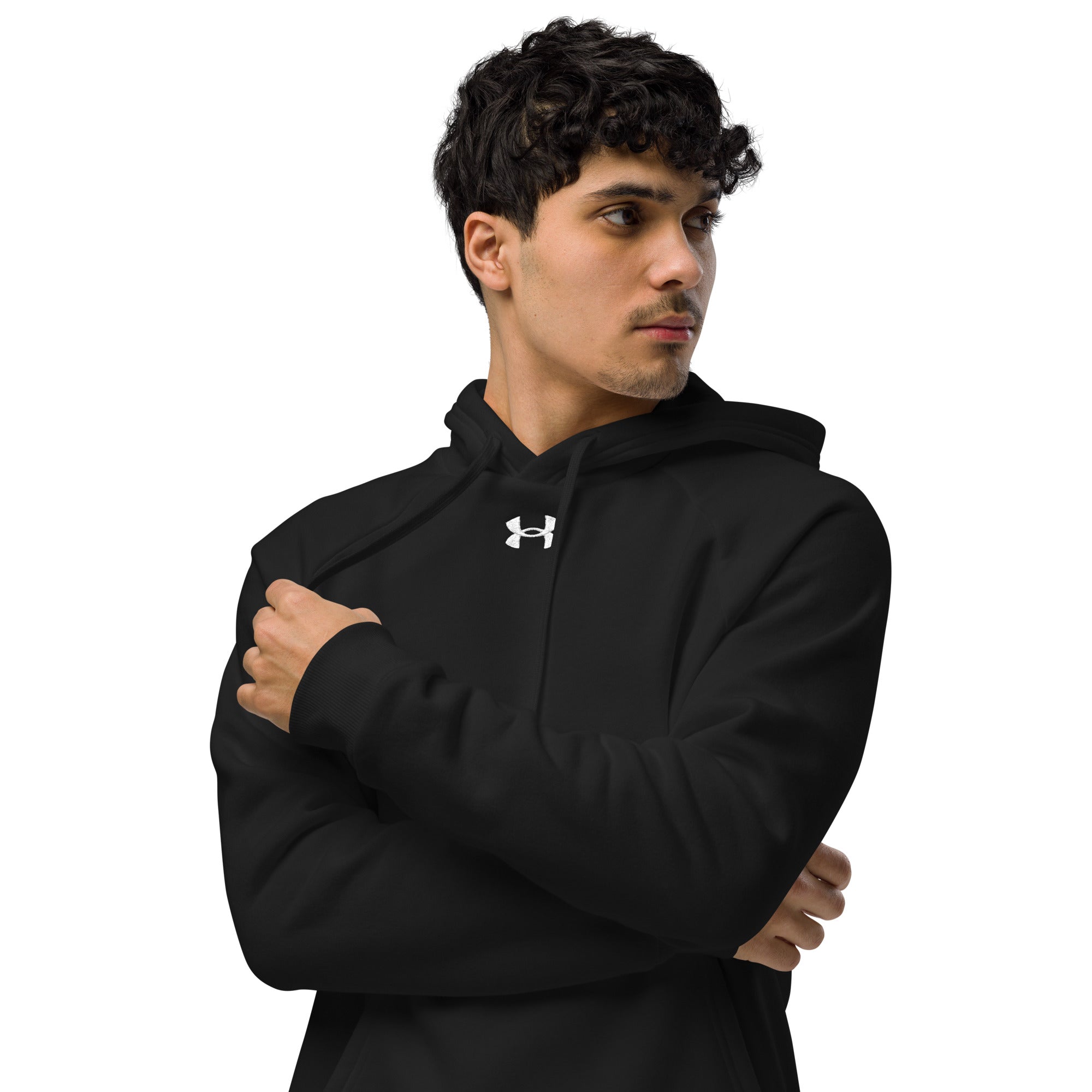 Person wearing a black Under Armour hoodie on a white background
