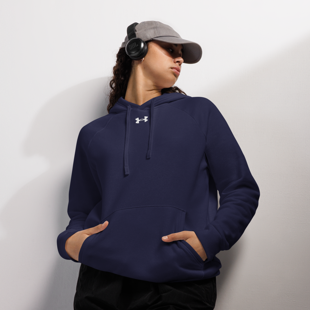 Person wearing a navy blue hoodie with a brand logo on a light gray background