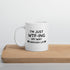 "White ceramic coffee mug with black text saying I&