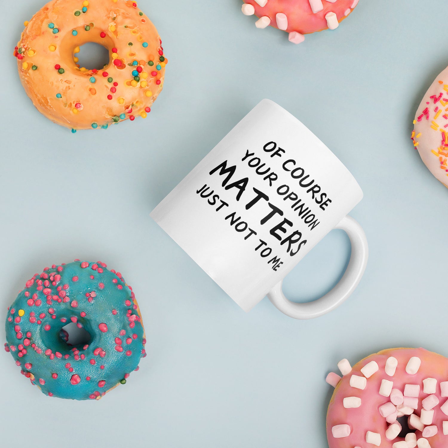 "White ceramic coffee mug with black text saying Of Course Your Opinion Matters Just Not to Me"