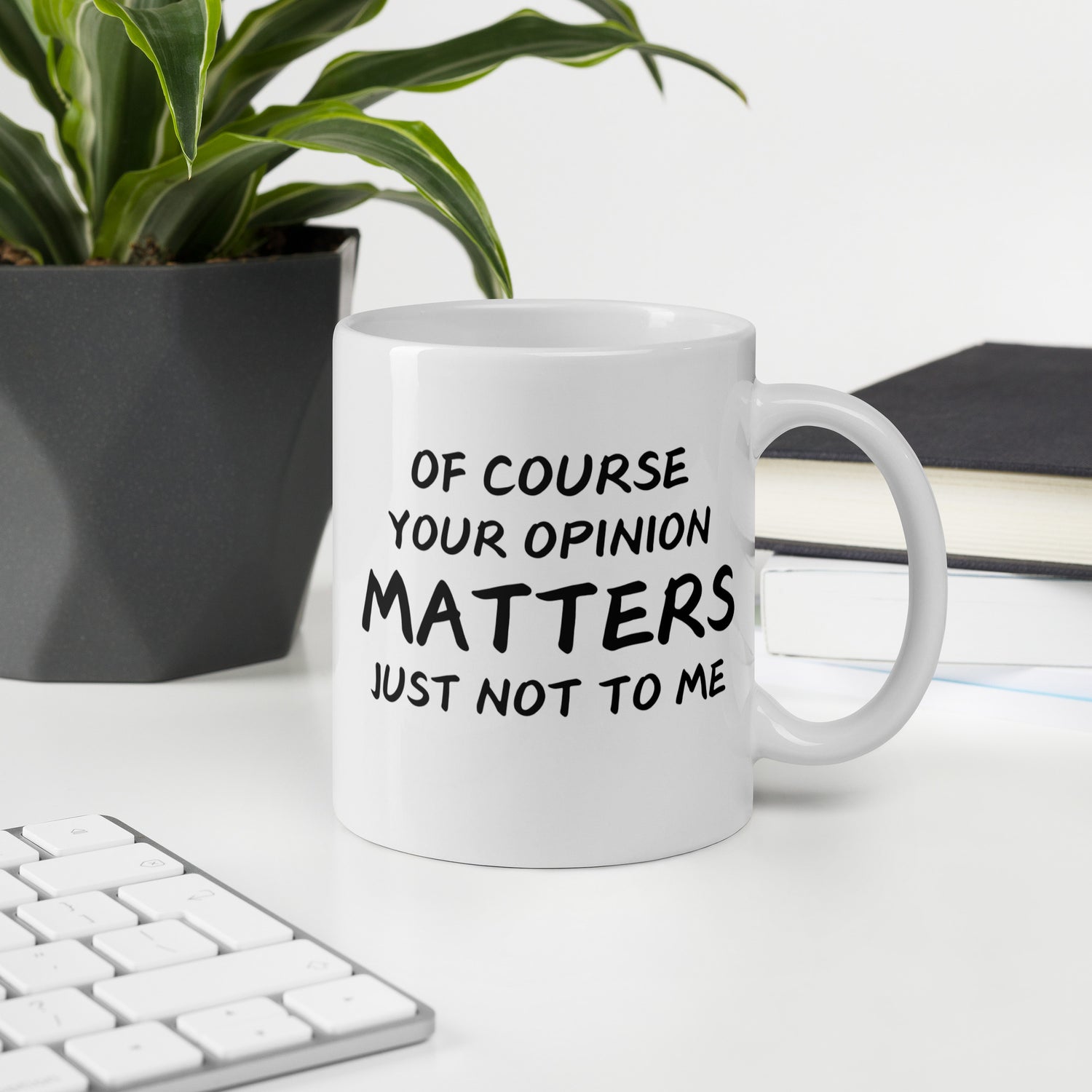 "White ceramic coffee mug with black text saying Of Course Your Opinion Matters Just Not to Me"